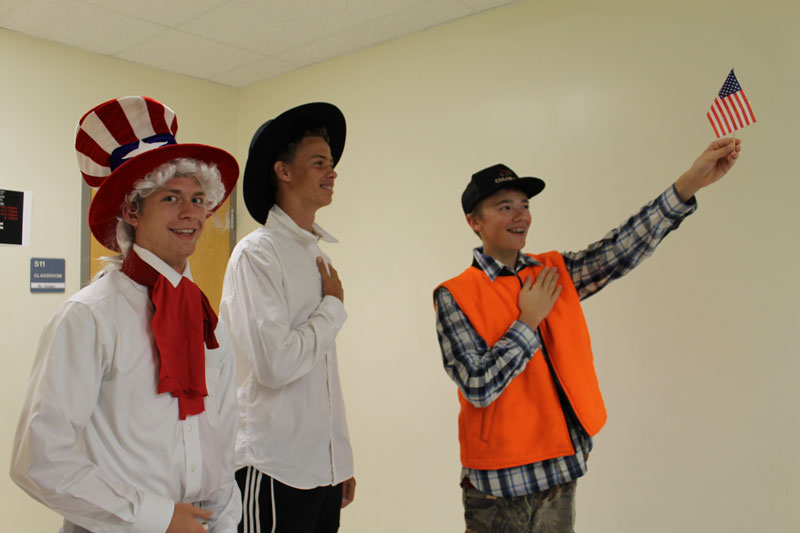 From left to right: Colin Adams, James Sims, and Robert (Bobby) Fricke show their patriotism on Merica Monday.