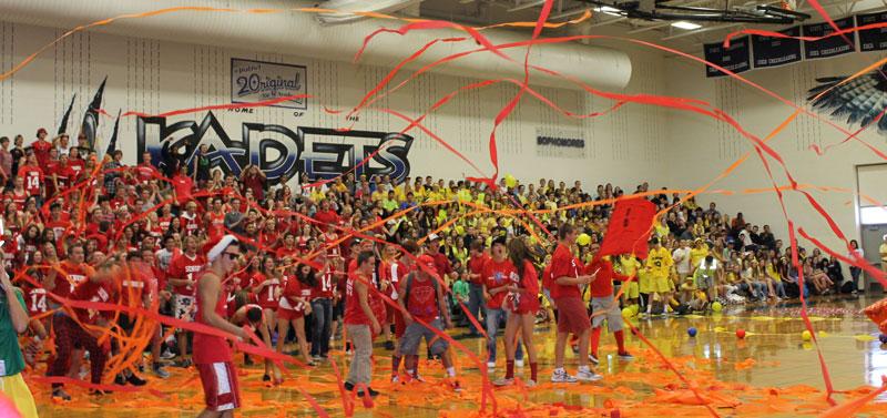The juniors and seniors rival against each other by throwing streamers to represent their classes.