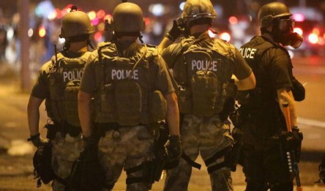 Police at the Ferguson riots. Photo from http://cbssanfran.files.wordpress.com/2014/08/police-2.jpg?w=594&h=349&crop=1