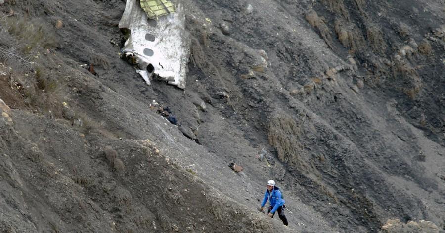 [After the Germanwings plane crash in the French Alps investigators try to find survivors and evidence of what happened] Photo via (The New York Times) under the Creative Commons License. [http://www.
nytimes.com/interactive/2015/03/26/world/
europe/germanwings cockpit-door-lock.html?_r=0]