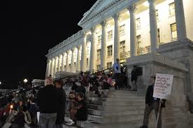 [Protesters protesting the exectution of Ronnie Lee Gardner] Photo via Wikipedia under Creative Commons License. [http://en.wikipedia.org/wiki/Capital_punishment_in_Utah] 