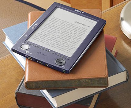 E-readers vs Paper books. Photo via Wikipedia.com under the Creative Commons license (http://commons.wikimedia.org/wiki/File:EBookreal.jpg) 