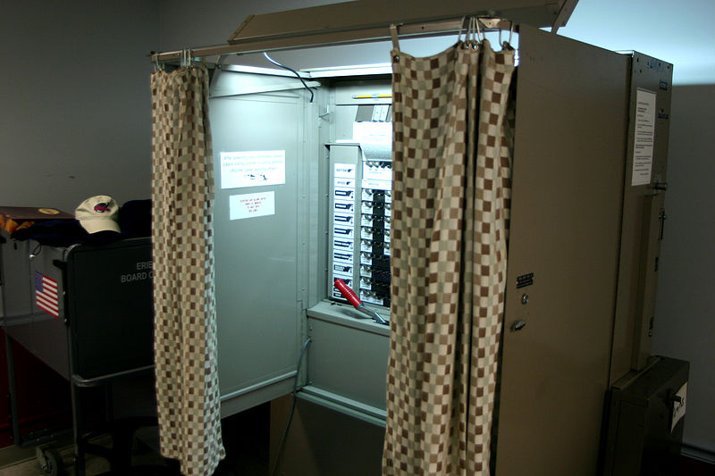 Voting Booth. https://commons.wikimedia.org/wiki/File:University_at_Buffalo_voting_booth.jpg WikimediaCommons. Photo used under the Creative Commons License.