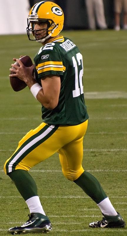 Green Bay quarterback Aaron Rodgers drops back for a pass. Photo via Wikimedia Commons under the Creative Commons license. 
https://upload.wikimedia.org/wikipedia/commons/c/c6/Aaron_Rodgers_drops_back_(cropped).jpg
