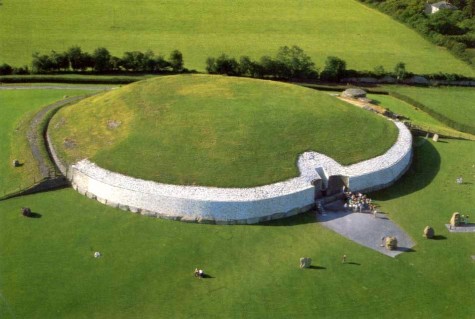 Newgrange tomb in Ireland. Photo via Wikimedia Commons under the Creative Commons license. https://en.wikipedia.org/wiki/File:Newgrange_from_air.JPG