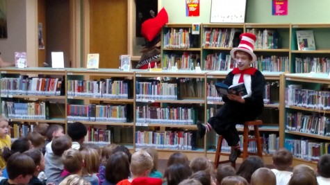 Micah Wilborn reads to Woodmen Roberts students.  Photo used with permission from Ellen Steinke.