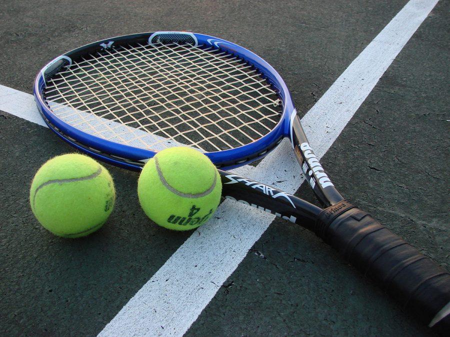 Photo via Wikimedia labeled for reuse under the creative common license 
https://commons.wikimedia.org/wiki/File:Tennis_Racket_and_Balls.jpg 
