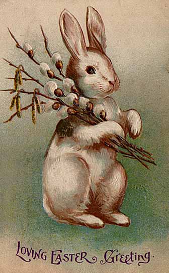 Easter Bunny holding rabbits ear buds. Image via Wikimedia Commons under the Creative Commons License.

https://commons.m.wikimedia.org/wiki/Category:
Easter_Bunny#/media/File%3AEaster_Bunny
_Postcard_1907.jpg