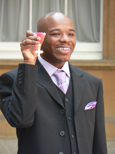 Stephen Wiltshire holding his MBE award for service to art in January 2006.
Photo via Wikimedia under the creative commons license.
https://commons.wikimedia.org/wiki/File:Stephen_Wiltshire_holding_MBE.jpg 