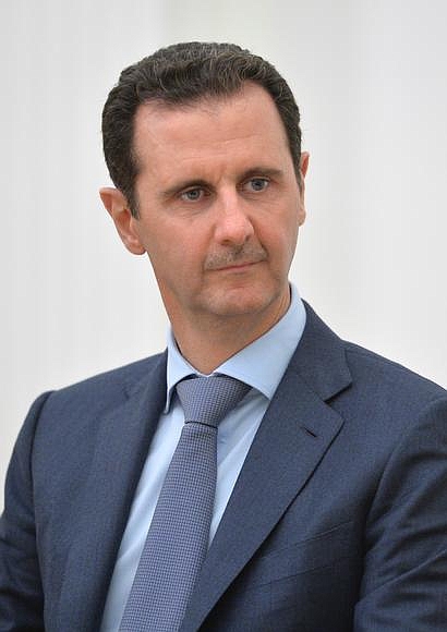 Bashar al Assad, Syrian President. Labeled for reuse by Wikimedia Commons.