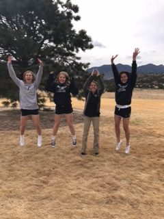 Avery Rodny, Reagan Brenenstuhl, Anna Cloonan, and Kali Maxwell (lacrosse coach), making the most of their high school career. Original photo by Reagan Brenenstuhl. 