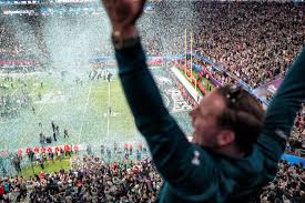 Picture of fan celebrating in the stadium after the Eagles win. Labeled for reuse by Wikimedia commons. 