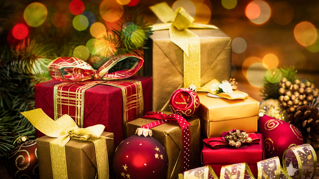 These Christmas gifts set the mood for the holiday season with their vibrant colors and hopeful aura. Image labeled for reuse by Shutterstock. 