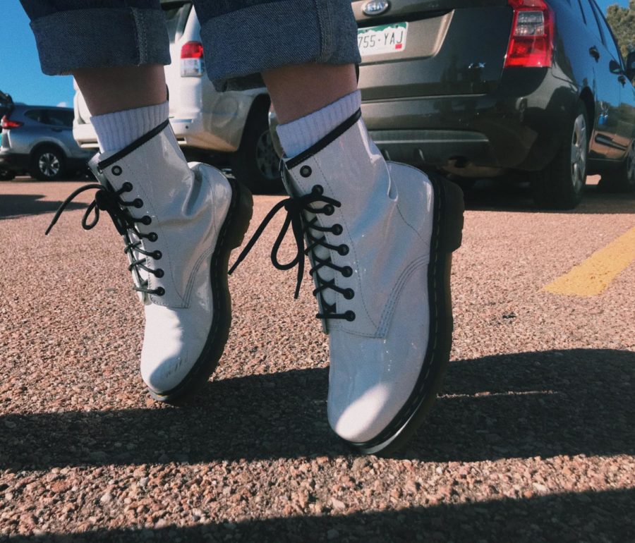 Sohomore Pearl Yocum sports her $115 White Doc Martens with some signature Michael Jackson poses