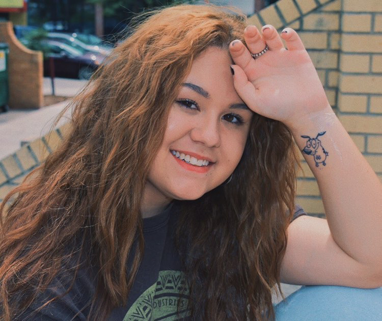 Village High School junior Savanna Rizzo poses with a tattoo she got for her sixteenth birthday.
