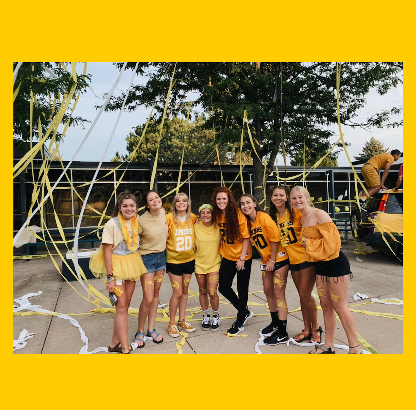 Seniors Ruth Evilsizer, Mary Waterman, Gabriella Robinson, Molly Matheson, Hope Crawford-Guanera, Emily Gregerson, Abigail Cole, and Gabrielle Young all soak up yellow during the Senior Sunrise. 