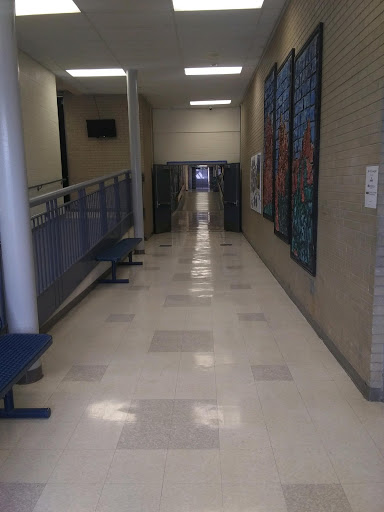 Empty D building art and engineering hallway during a passing period at Air Academy High School.
