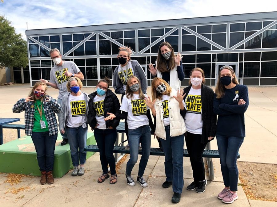 From left to right (front) teachers Emily Doryk, Traci Trimbach, Elise Hatfield, Jill Weis, Mary Anderson, Amy Cofield, Tateum Bowers; (back) David Miles, Dallas Hall, Rachel Cullen participating in the Walk Against Hate. 