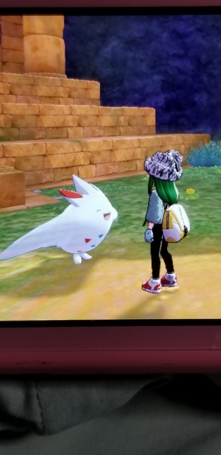 Emerald Peakes Pokemon character interacts with a Togekiss, named Toby.