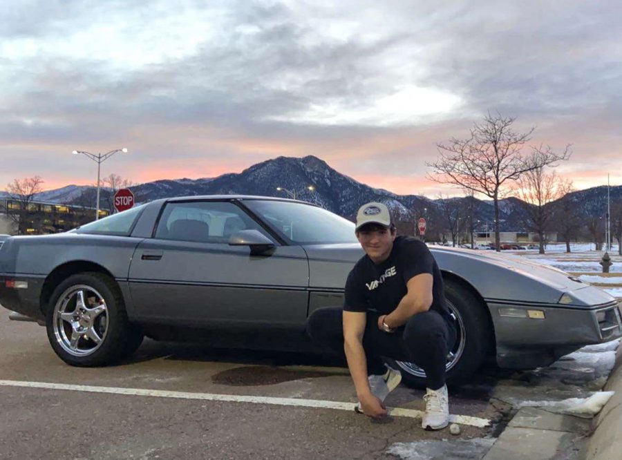 Senior Sean ONeil captures the moment with his magnificent machine and a pink Colorado sunset behind Blodgett Peak.