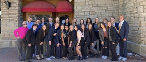 The Deca team gathers together to pose before a competition.