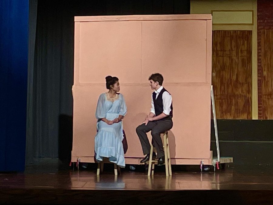 Pictured is junior Nina Guevarra (left) and senior Logan Walker (right) performing a scene.