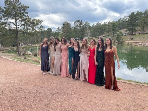 Air Academy High Schools Rustic Romanced themed prom photo taken at Fox Run Park in Black Forest, Colorado.