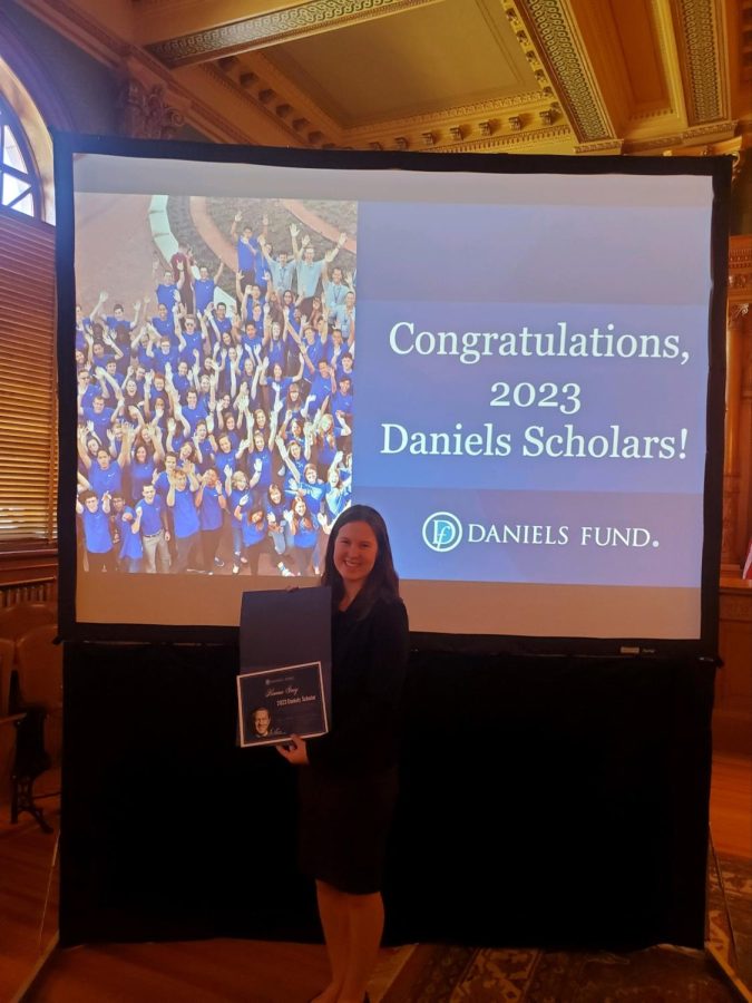 Senior Kianna Gray appearing absolutely ecstatic while posing at a Daniels Scholarship awards event! Photo referenced from Kianna Gray.
