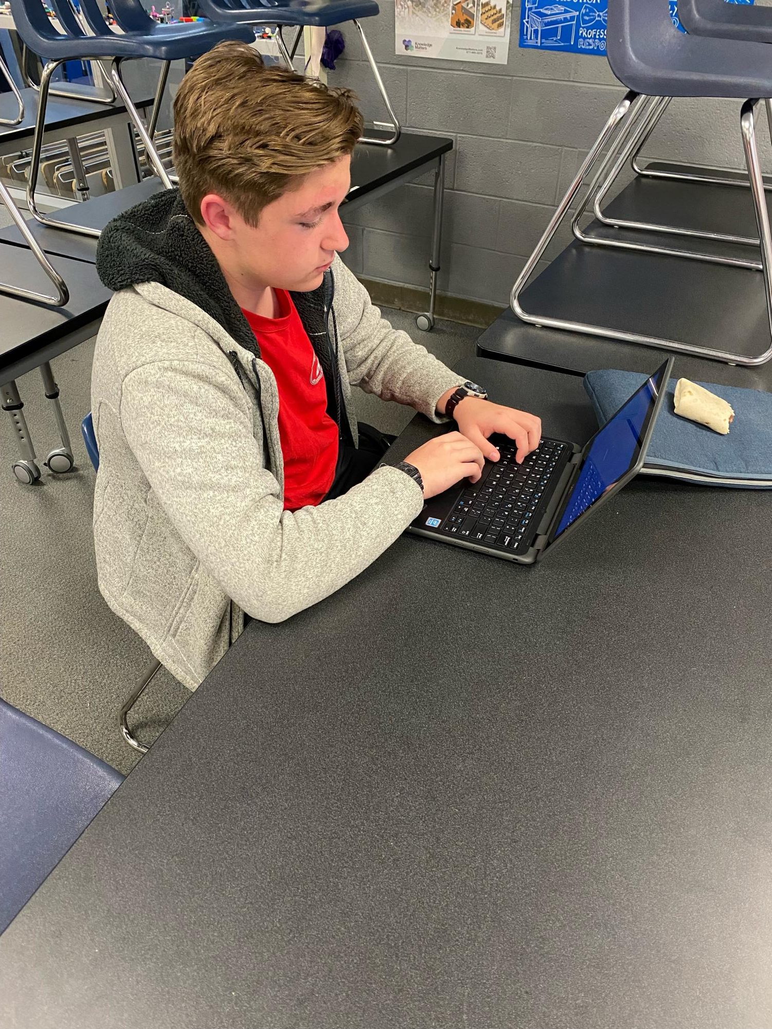 Sophomore Wyatt Sullivan comes to class early for preparation to study for finals. 