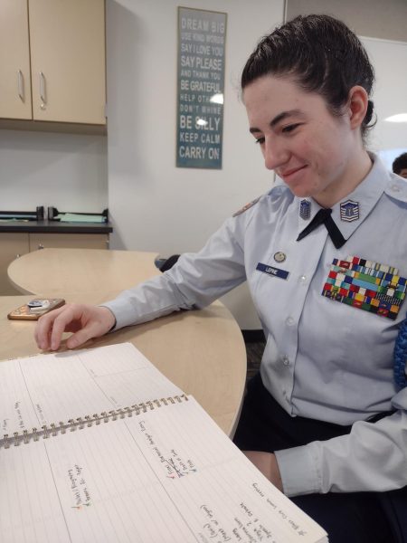 Junior Master Sergeant Erica Lepine works on the final details of the blood drive.
