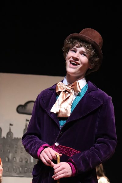 Wyatt preforming as Willy Wanka in a theater production 